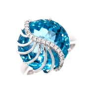 Золотое кольцо с бриллиантом и топазом swiss blue (арт. 119668-11.200-1181)